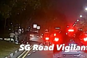 A video posted on Facebook group SG Road Vigilante shows the car and motorcycle colliding on the left side of the road. 