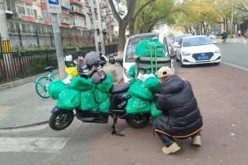 Delivery riders in Beijing said that orders have gone up between 30 and 50 per cent since last Friday.
