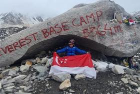 Six-year-old Om Madan Garg is the youngest Singaporean to finish the Everest Base Camp trek. 