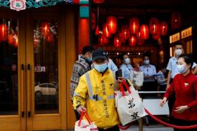 Beijing halted dining-in at restaurants, shuttered gyms and restricted entry into parks and monuments.