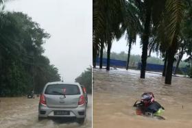 The group wanted to brave the flood on Jalan Nitar to continue with their journey to Kuantan, Pahang.