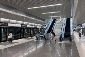 Commuters at the Orchard Boulevard TEL station on Nov 13, 2022