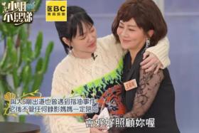 Taiwanese TV host Dee Hsu (left) demonstrates on her talk show how she was sexually harassed by a variety show host.