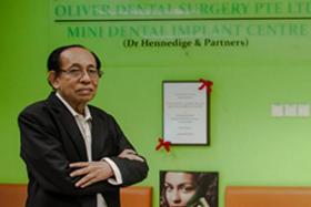 The Singapore Dental Council said Dr Oliver Hennedige did not take proper precautions to ensure the implants were safe.