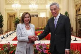 US Speaker of the House Nancy Pelosi and PM Lee Hsien Loong shake hands at the Istana, on Aug 1, 2022.