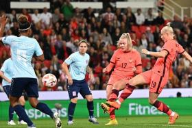England's Lauren Hemp (second from right) scores the ninth goal against Luxembourg at Stoke City's Bet365 Stadium on Sept 6, 2022.