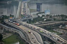 Travellers crossing the Causeway could expect to take between six and seven hours to get into Malaysia.