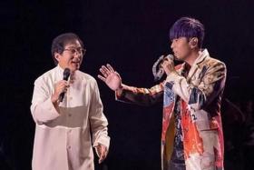 Mandopop king Jay Chou (right) with action star Jackie Chan  as his special guest at his concert in Tianjin on Sept 9.