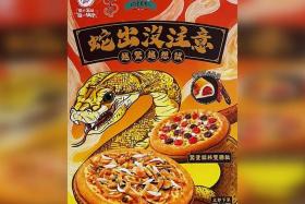 The pizza comes in a nine-inch serving and topped with snake meat, black mushrooms and Chinese dried ham.