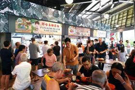 Patrons at the newly-opened Bukit Canberra Hawker Centre on Dec 17, 2022. 