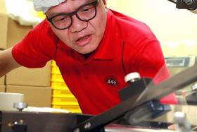 NEW MACHINERY: Mr Bruce Lei of Bake Mission.