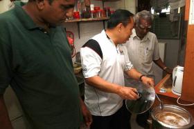 LEND A HAND: Mr David Kan (middle) showing Mr Mareedar Subramaniam and his son how to prepare a healthy meal. (Inset)  Mr Lai Nga Woo at his home.