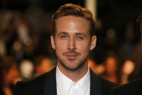 Director Ryan Gosling poses on the red carpet as he arrives for the screening of the film &quot;Lost River&quot; in competition for the category &quot;Un Certain Regard&quot; at the 67th Cannes Film Festival in Cannes May 20, 2014.