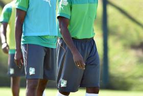  Yaya and Kolo Toure taking part in a training session in Aguas de Lindoia, Brazil early this week. Photo: 
