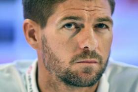 England captain Steven Gerrard wants QPR boss Harry Redknapp to reveal the Tottenham players who he claimed wanted to skip England duty. Photo: