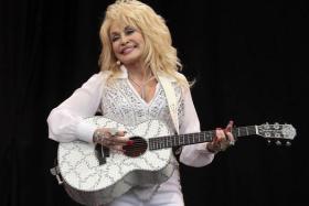 American country music star Dolly Parton performs on the Pyramid Stage at Worthy Farm in Somerset, during the Glastonbury Festival June 29, 2014. 