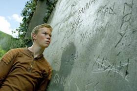 BUDDIES: Will Poulter (above) and Thomas Brodie-Sangster in the movie The Maze Runner. 