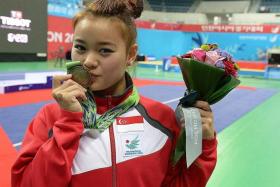 &quot;I was particularly pleased with my jump because I had to land on my toes. I hurt my toe again when I practised my moves about an hour before the competition and couldn’t move at all for five minutes.&quot; — Singapore’s bronze-medallist Tan Yan Ni (above), who scored 9.63, just 0.01 point ahead the fourth-placed Vietnamese Hoang Thi Phuong Giang