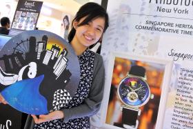 ARTIST: Miss Chloe Wong with the magnified replica of her watch dial — which was 44mm in diameter.
