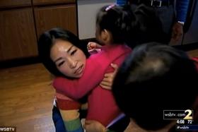 Liu with her four-year-old daughter. Screengrab WSBTV