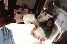 Nurse Nina Pham lying on her hospital bed at Texas Health Presbyterian Hospital in Dallas on Oct 16.