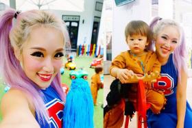 Xiaxue (left) and her son Dash in their Halloween costumes. 