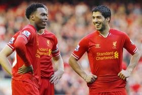 Liverpool&#039;s Daniel Sturridge (L) and Luis Suarez 