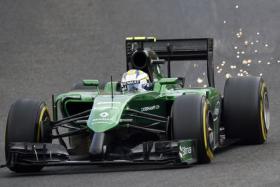 Caterham F1 Team&#039;s Swedish driver Marcus Ericsson competes during the third practice session at the Spa-Francorchamps circuit in Spa on August 23.