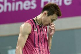 Malaysia&#039;s Lee Chong Wei reacts after a point against China&#039;s Lin Dan in their men&#039;s singles semi-final badminton match at Gyeyang gymnasium during the 2014 Asian Games in Incheon.