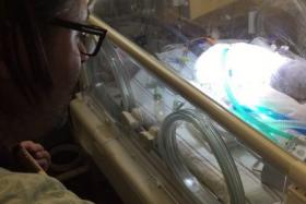 Chris Picco, singing to his dying newborn. A video of the moment was uploaded online on Nov 12. 