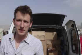 Islamic State militants said in a video November 16, 2014 they had beheaded U.S. hostage aid worker Kassig and warned the United States they would kill other U.S. citizens.