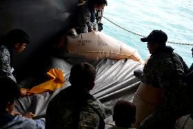 HAUL: An aircraft life raft was spotted by RSS Persistence yesterday morning in the Java Sea. It could not yet be confirmed if the life raft was from AirAsia flight QZ8501.