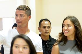 Cristiano Ronaldo and Irina Shayk visiting Crest Secondary School in 2013