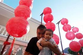 FESTIVE: Christopher Lee with baby Zed in Malacca to visit Lee&#039;s family over Chinese New Year.