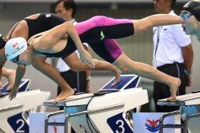 THE SWIMMING QUAHS: Jing Wen (above), Ting Wen (inset, top) and Zheng Wen (inset, above).