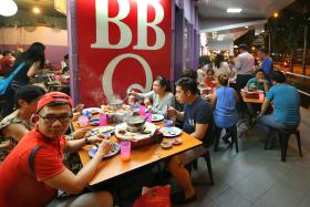 CALM: Business for hotpot eateries along Beach Road and Liang Seah Street was still busy yesterday evening.