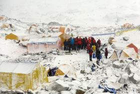 CHECKING STATUS: A climbing team doing a headcount at Everest Base Camp after the avalanche.