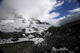 STUCK: Some trekkers were stranded on Mount Everest (above) when the avalanche hit but one Singaporean team managed to descend to safety. Many Nepalese are feared to be trapped under the rubble.