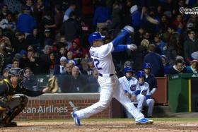 Chicago Cubs rookie Addison Russell loses control of his bat during the seventh inning of their match against the Pittsburgh Pirates.