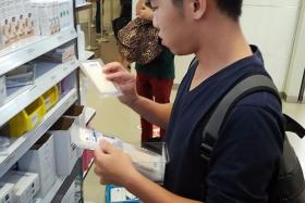 SUPPLIES: Mr Brandon Chia (above), 22, buying medical supplies at Singapore General Hospital for a medical relief trip to Nepal tomorrow.