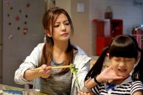 REAL & REEL-LIFE MUM: Zhao plays a strict mum who is overly concerned about her daughter's education.