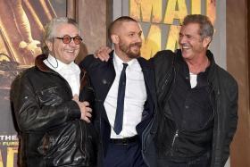 MADCAP: Director George Miller with his two Maxes, Tom Hardy and Mel Gibson.