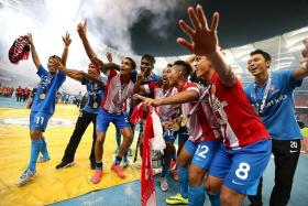 WHAT A FEELING: The LionsXII players paying tribute to the travelling fans.
