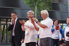 PHILIPPINES: Chef de mission Julian Camacho (centre) with Ricardo Garcia (right), chairman of the Philippine Sports Commission, at the welcome ceremony.