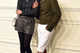 SNAZZY: Pharrell Williams and wife Helen Lasichanh at the Chanel Paris-Salzburg 2014/15 Metiers d'Art Collection in March.