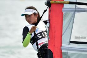 PROUD: Audrey Yong (above) emerges victorious in the women&#039;s RSX windsurfing event.  