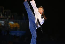 HIGH KICK: Chelsea Sim wowing her way to the individual poomsae gold yesterday. 