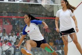 VICTOR AND VANQUISHED: Malaysia&#039;s Rachel Arnold (above, right) on her way to beating Indonesia&#039;s Catur Yuliana, and Singapore&#039;s Vivian Rhamanan after his defeat.