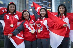 WIN WITHOUT WIND: Singapore&#039;s women&#039;s keelboat team (above) were automatically awarded the gold medal after the event failed to start due to delays caused by a lack of sailing wind.