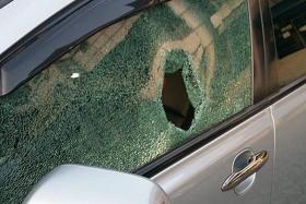 BROKEN: The left window of Mr Darren Tan&#039;s car was shattered in the incident at Johor Baru on Tuesday.